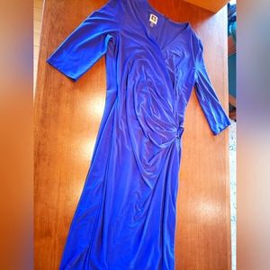 Anne Klein long sleeved dress with hardware on the hip